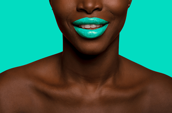 woman wearing teal colored lipstick