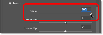 Dragging the Smile slider in the Properties panel of Photoshop